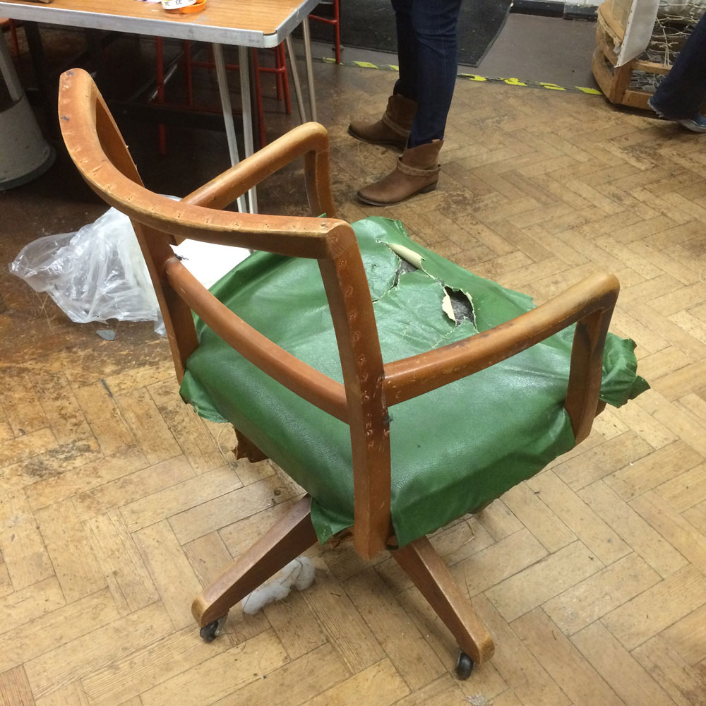 Vintage-Swivel-Chair-in-green-back-view
