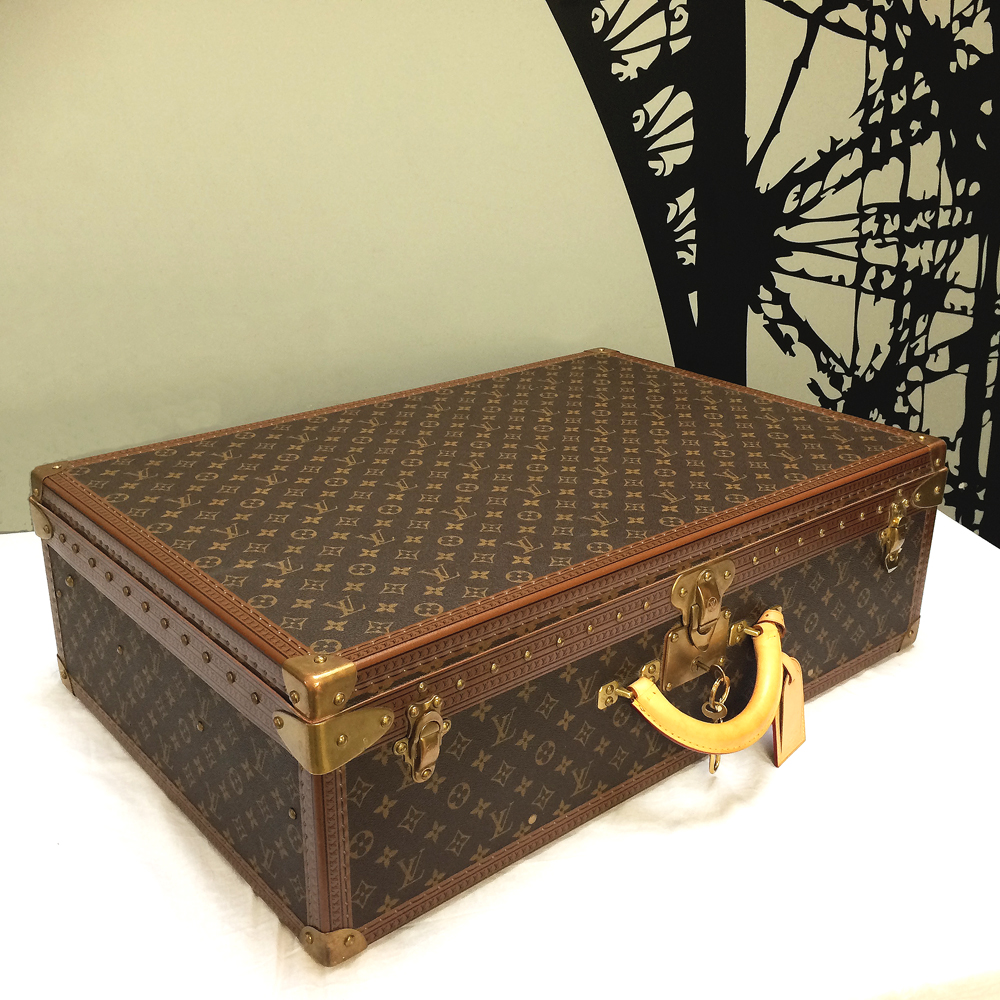 Bonhams : Louis Vuitton a Monogram Alzer 70 Suitcase c.1960 (includes  luggage tag)